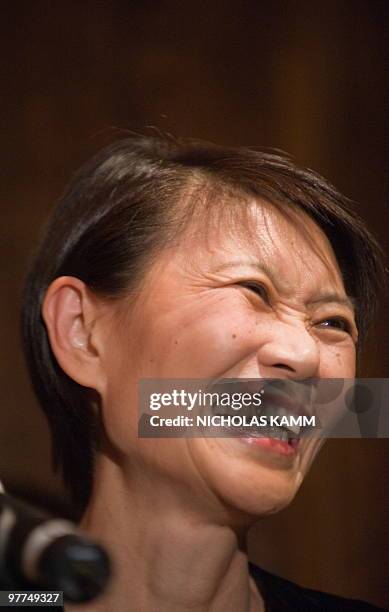 Chow Mei-ching, wife of Taiwanese President Ma Ying-jeou, laughs before making remarks at a reception before a performance of the Cloud Gate Dance...