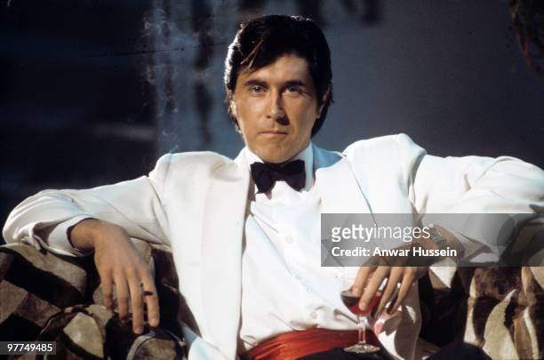 Bryan Ferry of Roxy Music poses during a portrait session for his album 'Another Place, Another Time' on July 1, 1974 in London, England.