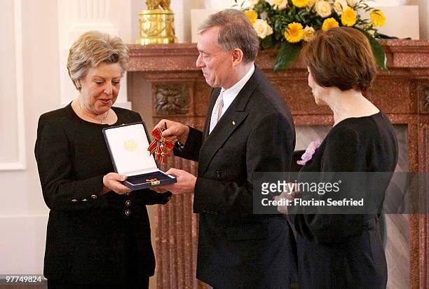 Actress Marie-Luise Marjan receives the Federal Cross Of Merit from German President Horst Koehler and his wife Eva Luise Koehler at Bellevue Castle...