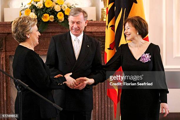 German President Horst Koehler and his wife Eva Luise Koehler and actress Marie-Luise Marjan pose for a picture after she received the Federal Cross...