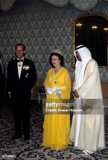 Queen Elizabeth ll and Prince Philip, Duke of Edinburgh meet Sheikh Rashid, the ruler of Dubai as part of their tour of the Gulf States on February...