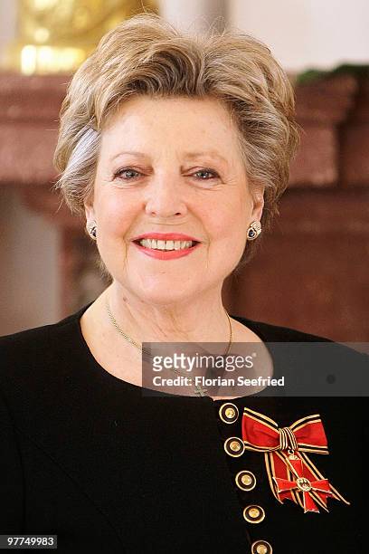 Actress Marie-Luise Marjan smiles after she received the Federal Cross Of Merit from German President Horst Koehler at Bellevue Castle on March 16,...