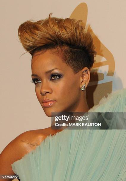 Singer Rihanna arrives on the red carpet during the Pre-Grammy Gala at the Beverly Hilton Hotel in Beverly Hills on January 30, 2010. The...