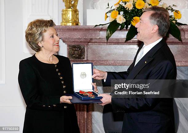 Actress Marie-Luise Marjan receives the Federal Cross Of Merit from German President Horst Koehler at Bellevue Castle on March 16, 2010 in Berlin,...