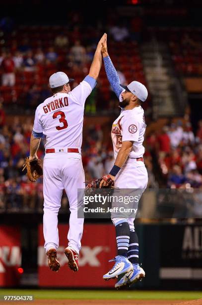 Matt Carpenter and Jedd Gyorko of the St. Louis Cardinals celebrate after the Cardinals defeated the Chicago Cubs 5-0 at Busch Stadium on June 17,...