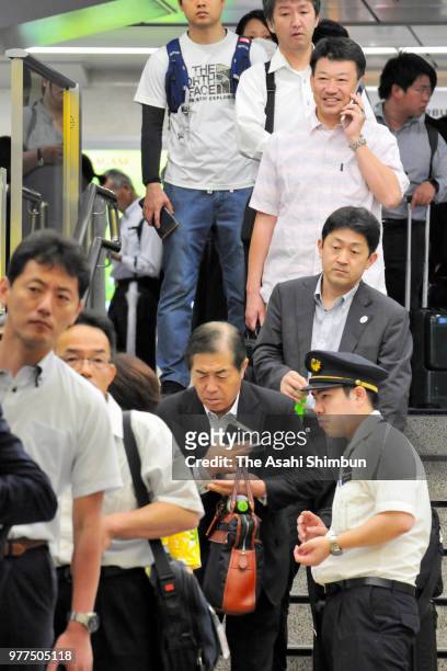 Passengers of Shinkansen are seen at Nagoya Station after the magnitude 6.1 strong earthquake in Osaka and surrounding area suspend the service on...
