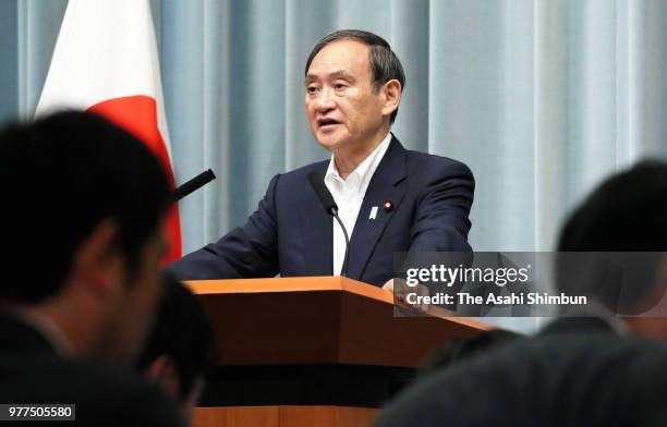 Chief Cabinet Secretary Yoshihide Suga speaks during a press conference after the magnitude 6.1 strong earthquake on June 18, 2018 in Tokyo, Japan. A...
