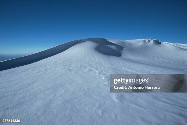 snowy hill under clear sky, granada, spain - andalucian sierra nevada stock pictures, royalty-free photos & images