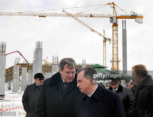 Vice Prime Minister on preparation of Ukraine for the Euro 2012 Borys Kolesnikov talks on March 16, 2010 with officials as he visits the construction...