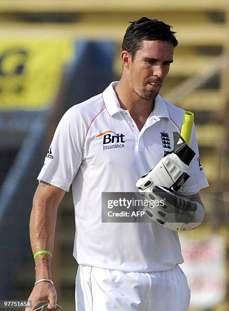 England cricketer Kevin Pietersen leaves the field after being dismissed on 99 runs during the first day of play in the first Test match between...