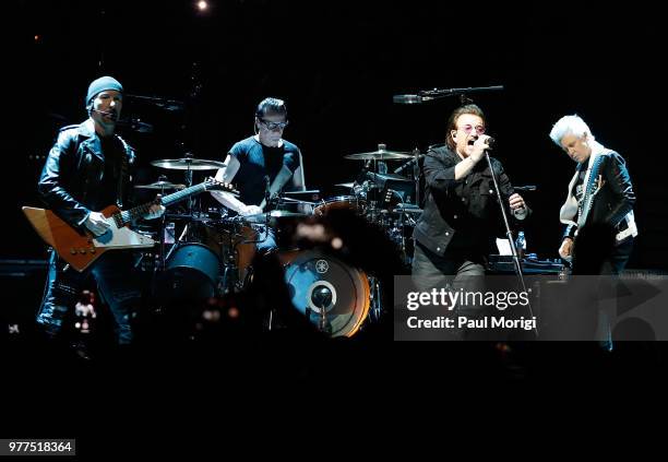 The Edge, Larry Mullen, Jr., Bono, and Adam Clayton of U2 perform during the eXPERIENCE + iNNOCENCE TOUR at the Capital One Arena on June 17, 2018 in...