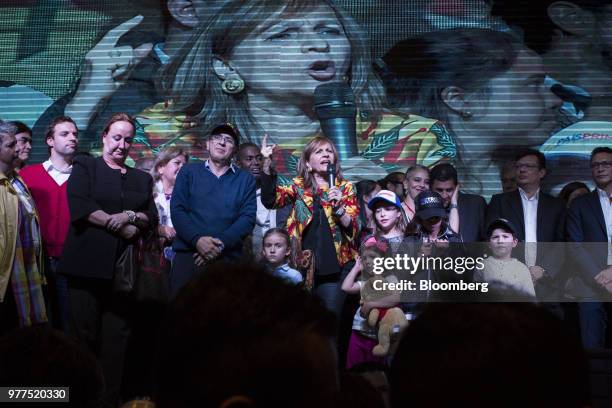 Angela Maria Robledo, vice presidential candidate for the Progressivists Movement Party, center, speaks during an election night event at the party's...