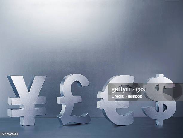 yen, pound, euro and dollar signs in a row - simbolo monetario foto e immagini stock