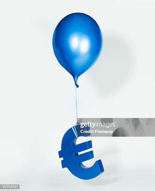 balloon lifting euro sign - euro symbol bildbanksfoton och bilder