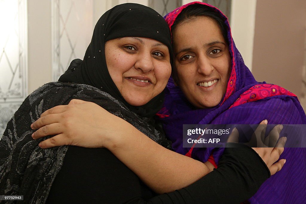 Akila Naqqash (R), mother of five-year-o
