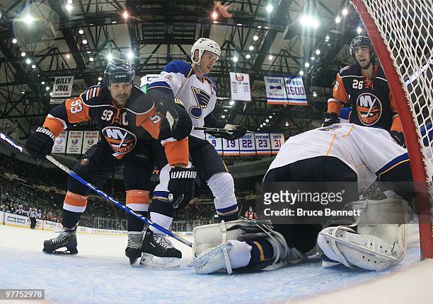 Doug Weight of the New York Islanders skates against the St. Louis Blues at the Nassau Coliseum on March 11, 2010 in Uniondale, New York.