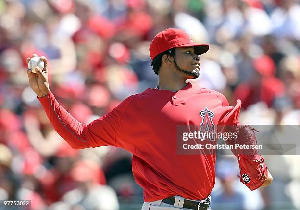 Starting pitcher Ervin Santana of the Los Angeles Angels of Anaheim pitches against the Kansas City Royals during the MLB spring training game at...