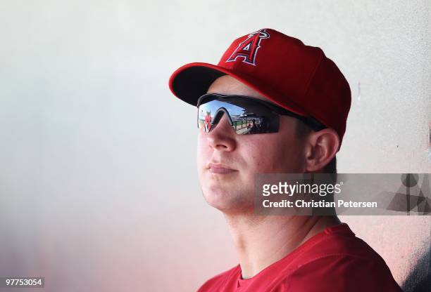 Robb Quinlan of the Los Angeles Angels of Anaheim sits in the dugout during the MLB spring training game against the Kansas City Royals at Surprise...