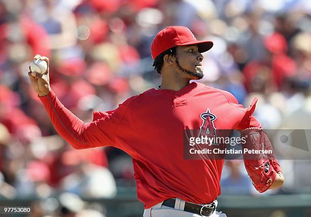 Starting pitcher Ervin Santana of the Los Angeles Angels of Anaheim pitches against the Kansas City Royals during the MLB spring training game at...