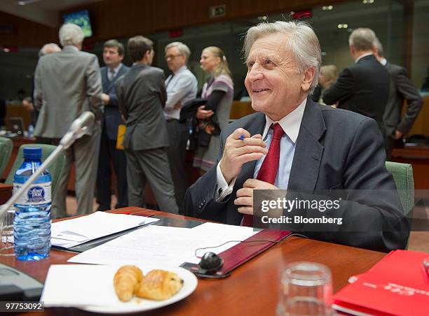 Jean-Claude Trichet, president of the European Central Bank, gestures during the meeting of European Union finance ministers, at the EU headquarters...