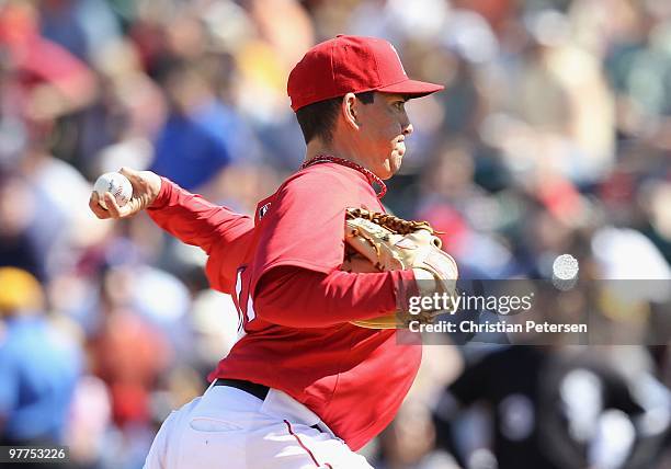 Relief pitcher Brian Fuentes of the Los Angeles Angels of Anaheim pitches against the Chicago White Sox during the MLB spring training game at Tempe...