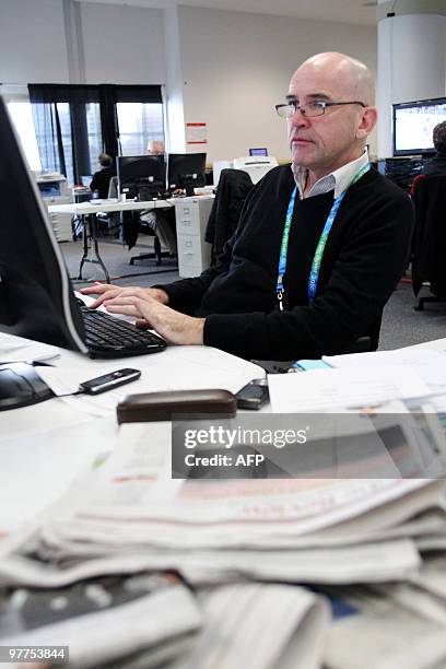 Desk on February 25 during the Vancouver 2010 Olympic Winter Games. AFP PHOTO / STEPHANIE LAMY