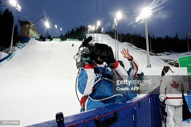Crews working at Cypress Mountain on February 25 during the Vancouver 2010 Olympic Winter Games. AFP PHOTO / STEPHANIE LAMY
