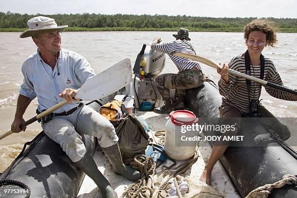 Colombian scientist Ariadna Libertad Burgos of the National Museum of Natural History and her colleagues sit on their zodiac boat prior to take...