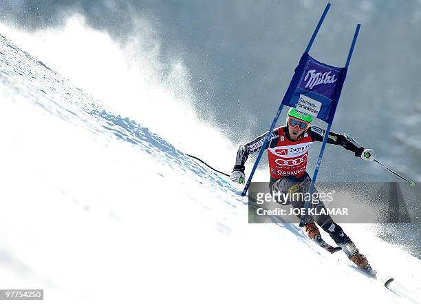 Ted Ligety competes in the men's Alpine skiing World Cup Giant Slalom in Garmisch Partenkirchen, southern Germany on March 12, 2010. AFP PHOTO / JOE...