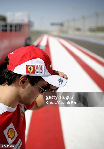 Felipe Massa of Brazil and Ferrari is seen before the Bahrain Formula One Grand Prix at the Bahrain International Circuit on March 14, 2010 in Sakir,...
