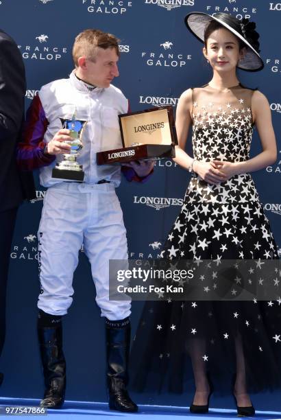 Prix de Diane Longines 2018 jockey winner Patrick J McDonald and Longines ambassador of Elegance Zhao Liying attend the Prix de Diane Longines 2018...