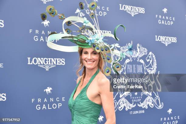 Miss France1998 TV presenter Sophie Thalmann dressed by Christophe Guillarme and hat from Celine Cave attends the Prix de Diane Longines 2018 at...
