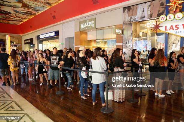 Customers wait in line to attend the Morphe store opening at the Miracle Mile Shops at Planet Hollywood Resort & Casino on June 16, 2018 in Las...