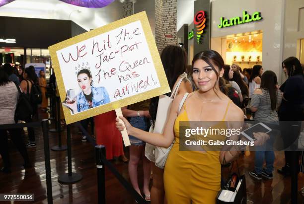 Fan holds up a sign for Jaclyn Hill during Morphe store opening at the Miracle Mile Shops at Planet Hollywood Resort & Casino on June 16, 2018 in Las...