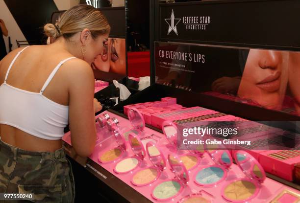 Customer looks at makeup products during a Morphe store opening at the Miracle Mile Shops at Planet Hollywood Resort & Casino on June 16, 2018 in Las...