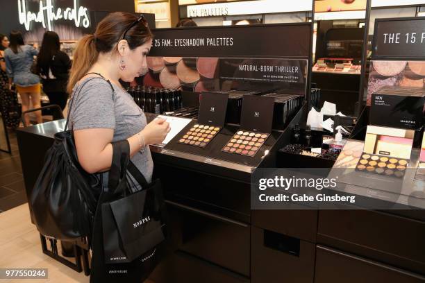 Customer looks at makeup products during a Morphe store opening at the Miracle Mile Shops at Planet Hollywood Resort & Casino on June 16, 2018 in Las...