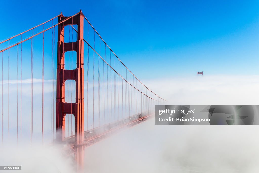 Golden Gate Bridge covered in fog, San Francisco, California, USA