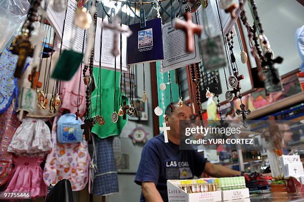 Seller waits for buyers at the Municipal market in Cartago, some 25 km south of San Jose, on March 13, 2010. AFP PHOTO/ Yuri CORTEZ