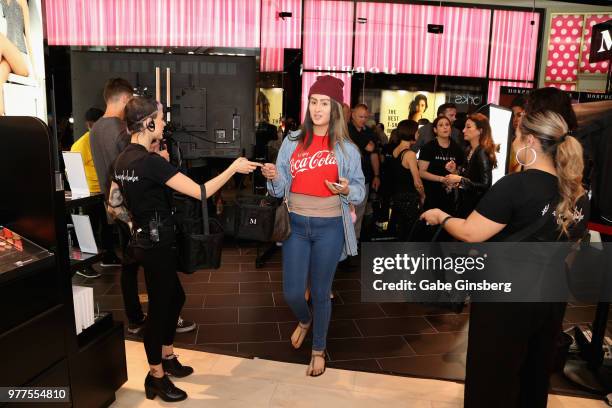 Morphe employees greet guests during a Morphe store opening at the Miracle Mile Shops at Planet Hollywood Resort & Casino on June 16, 2018 in Las...