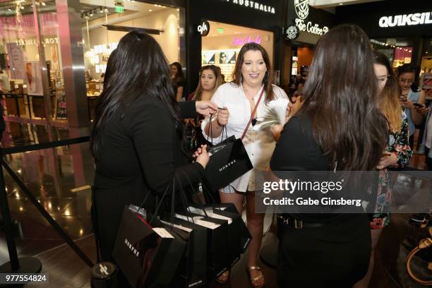 Morphe employees greet guests during a Morphe store opening at the Miracle Mile Shops at Planet Hollywood Resort & Casino on June 16, 2018 in Las...