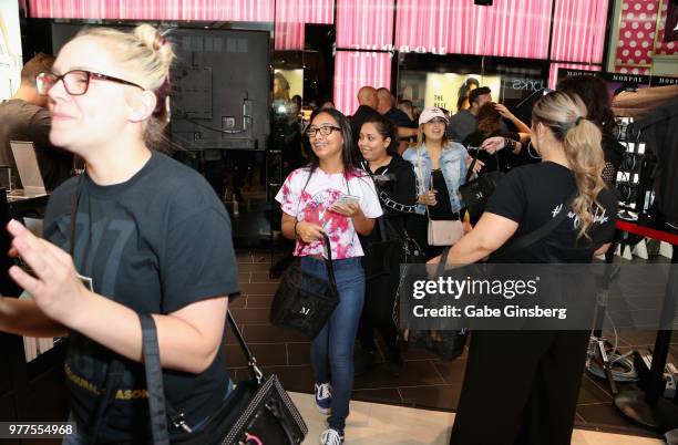 Morphe employees greet guests during a Morphe store opening at the Miracle Mile Shops at Planet Hollywood Resort & Casino on June 16, 2018 in Las...