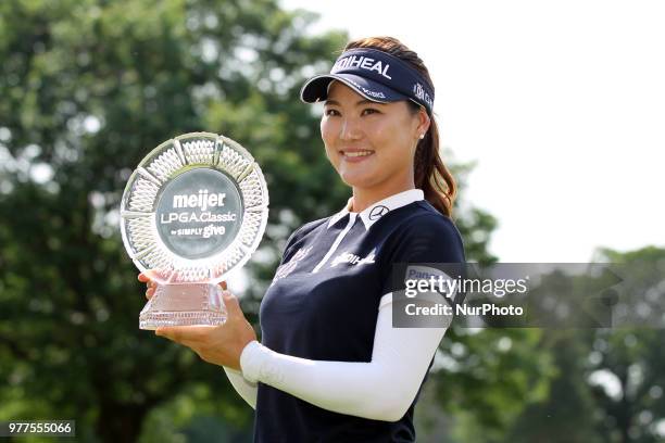 So Yeon Ryu of Republic of Korea holds the trophy after winning the tournament during the final round of the Meijer LPGA Classic golf tournament at...