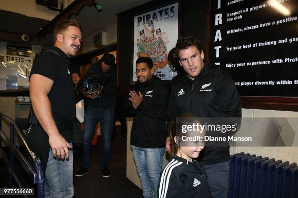 Matt Todd, Sam Cane and Te Toiroa Tahuriorangi of the All Blacks arrive at the Pirates Rugby Club to help paint the newly built pirate ship stage...