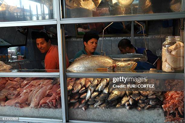 Fish stall at the Municipal market in Cartago, some 25 km south of San Jose, on March 13, 2010. AFP PHOTO/ Yuri CORTEZ