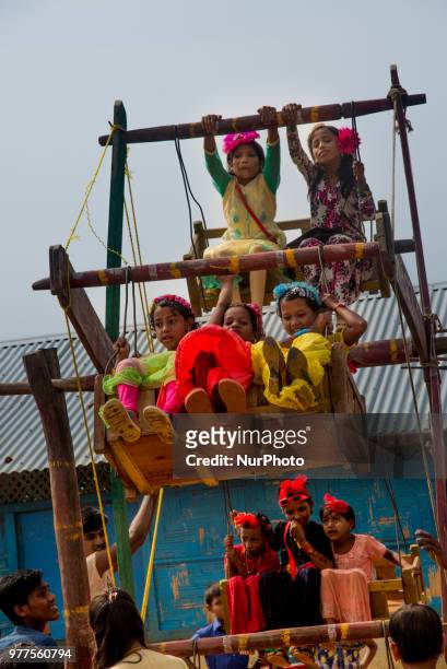 Rohingya Children are celebrating Eid day by the rides of Nagardola as held at Kutupalong Camp in Cox's Bazar Bangladesh on 16 June, 2018.