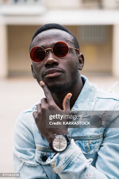 african man with sunglasses. - black suit sunglasses stock pictures, royalty-free photos & images