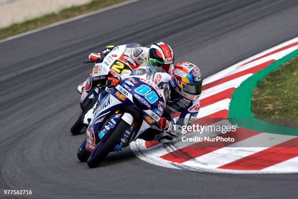 Jorge Martin of Spain and Del Conca Gresini Moto3, Tatsuki Suzuki of Japan and Sic58 Squadra Corse Honda during the race day of the Gran Premi...