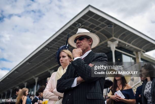 People attend the 169th Prix de Diane horse racing on June 17, 2018 in Chantilly, northern Paris.