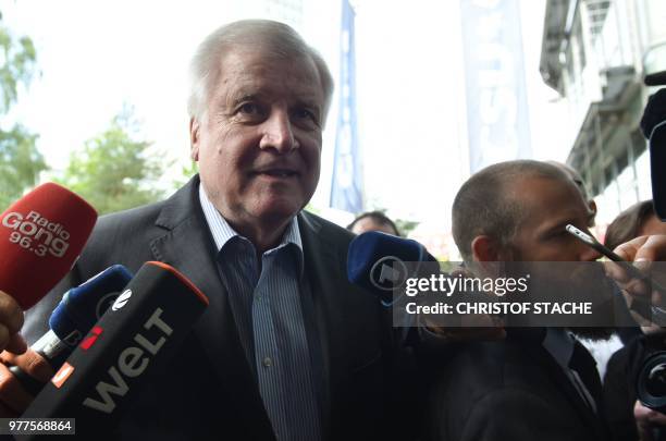 German Interior Minister and leader of the Christian Social Union Party Horst Seehofer arrives at his party headquarters in Munich on June 18 2018,...