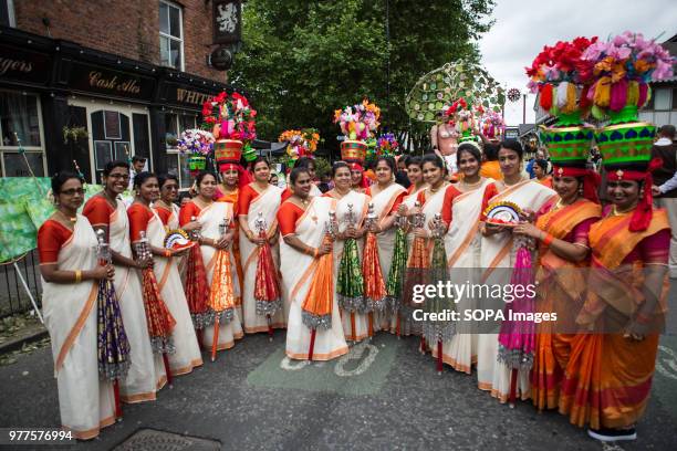 Women dressed in Indian costumes during the Manchester day festival. Manchester Day is an annual event that celebrates everything great about the...